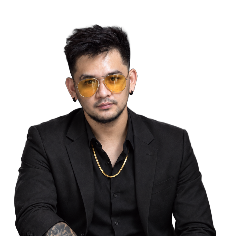 Miguel Martin Napiza in a black suit and yellow aviators